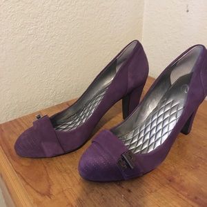 Comfortable purple pumps.